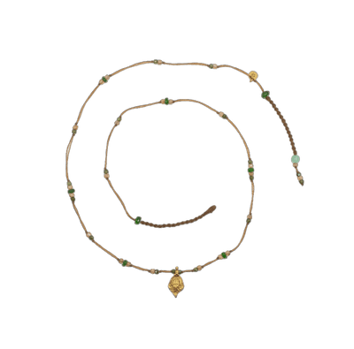 Collier Goldie - Mix Tsavorite - Fil Tabac wird zu Collier Goldie - Tsavorite-Mix - Tabakfaden. 
Eine passende Übersetzung wäre: Collier Goldie - Tsavorite-Mix - Tabakfaden